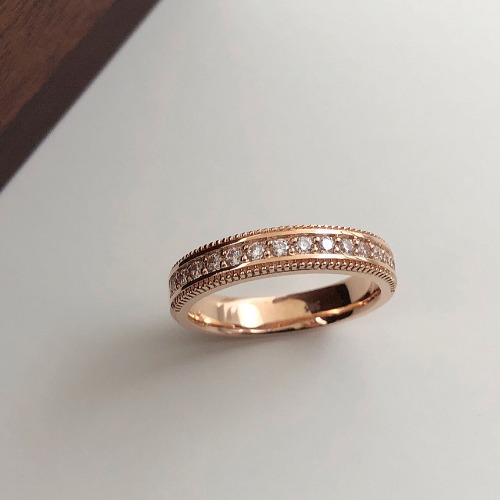 Raw jewelry product photo on a plain surface